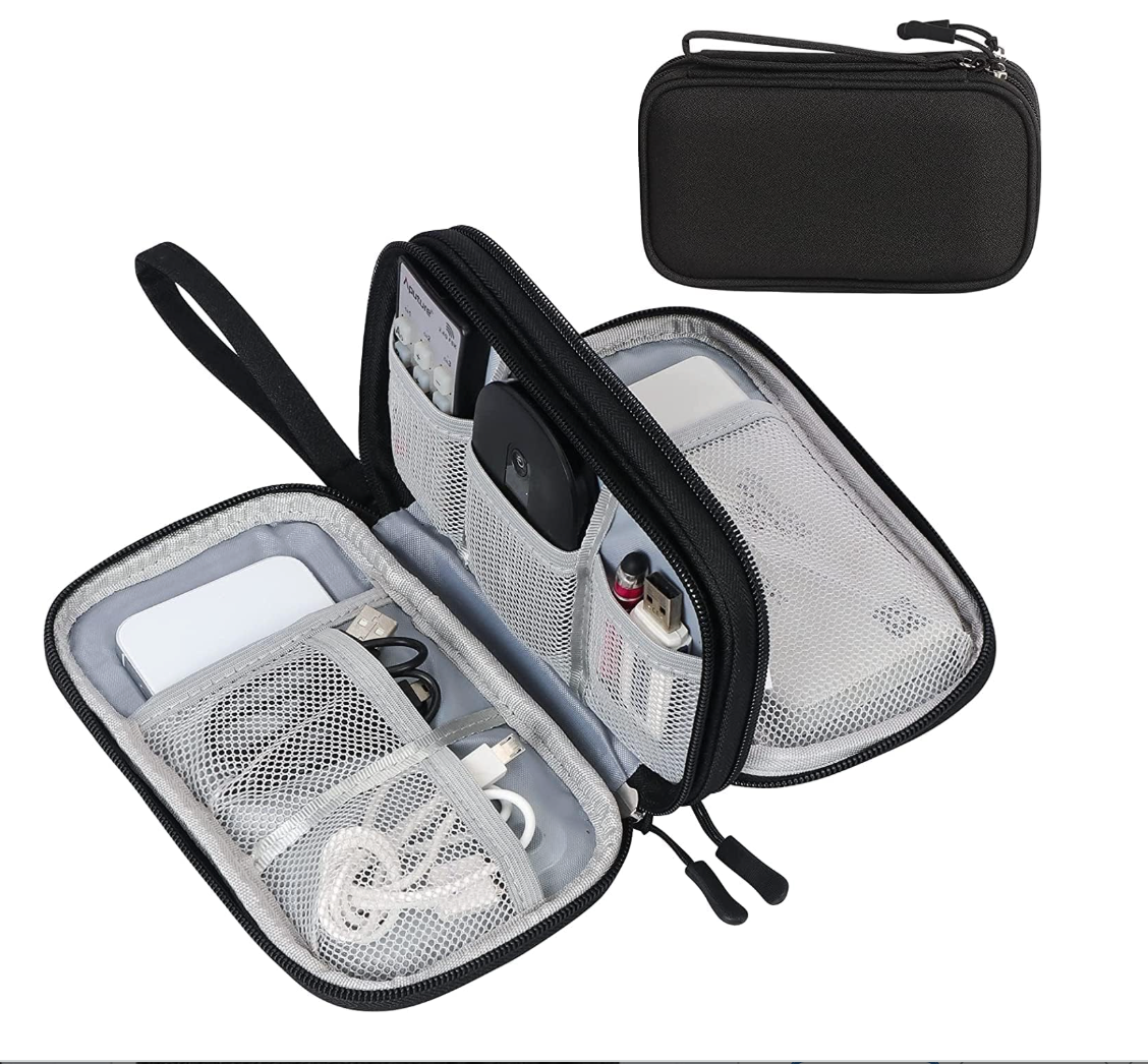 A black zippered travel organizer case shown open, revealing multiple interior compartments, mesh pockets, and storage slots with cables and accessories. A smaller closed view of the same case appears in the upper right on a plain white background.