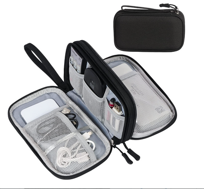 A black zippered travel organizer case shown open, revealing multiple interior compartments, mesh pockets, and storage slots with cables and accessories. A smaller closed view of the same case appears in the upper right on a plain white background.