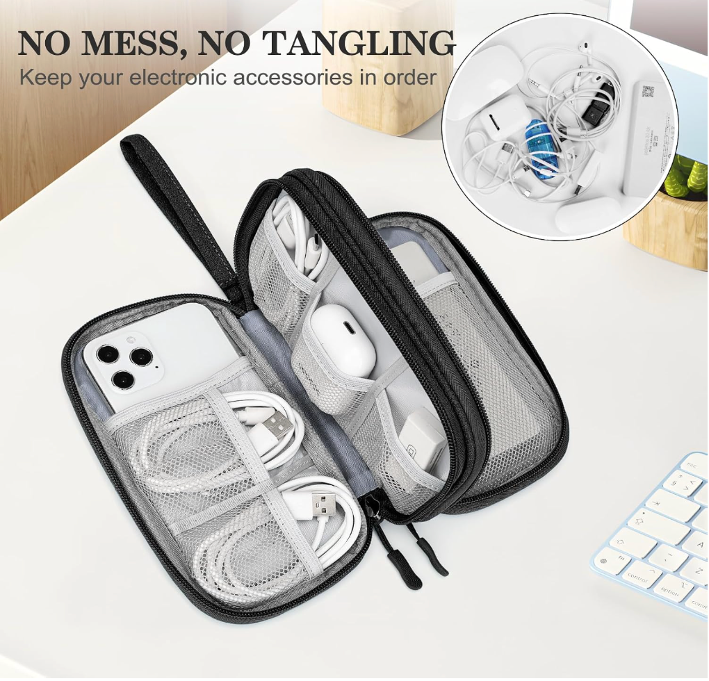 A black and gray mesh zippered electronic accessory organizer case shown open on a white desk, holding a phone, earbuds, and charging cases. The image includes text reading 'NO MESS, NO TANGLING' and a circular inset showing tangled accessories inside the case.