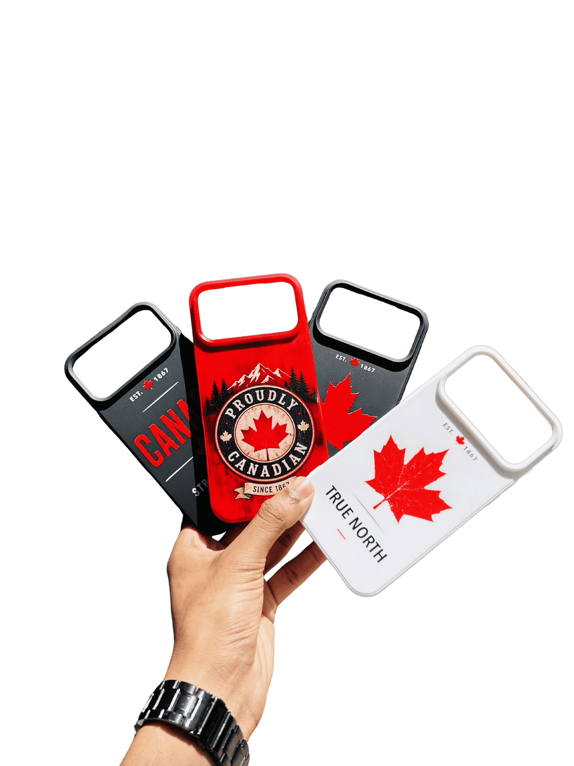 Three phone cases with Canadian designs held by a hand on a transparent background