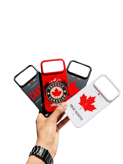 Three phone cases with Canadian designs held by a hand on a transparent background